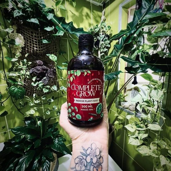 CompleteGrow product surrounded by healthy customer plants